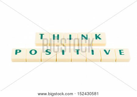 Letters forming the words THINK POSITIVE on a white background