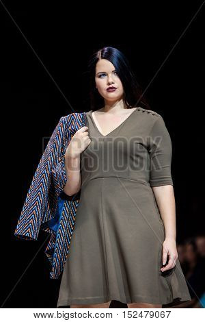 MOSCOW RUSSIA - OCTOBER 19 2016: Plus size model walk runway for LA REDOUTE & PLUS-SIZE MOSCOW catwalk at Spring-summer 2017 Moscow Fashion Week.