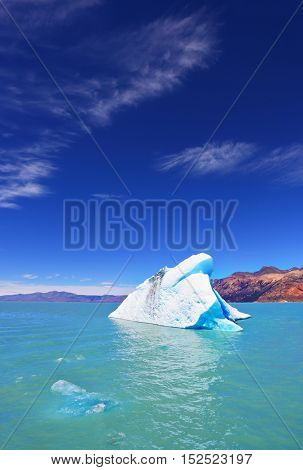  The unique lake Viedma  in droughty Patagonia. Huge white-blue icebergs float in ice emerald waters of the lake in Argentina