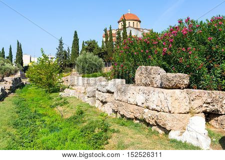 Ruins and part of old wall in ancient Kerameikos district in Athens, Greece