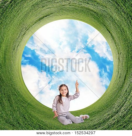 Stereographic panoramic projection of a green field and sky