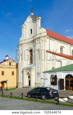 MINSK BELARUS - OCTOBER 1 2016: Unidentified man goes near Catholic Church of St. Joseph (now - Belorussian State Archive-Museum of Literature and Art) Minsk Belarus