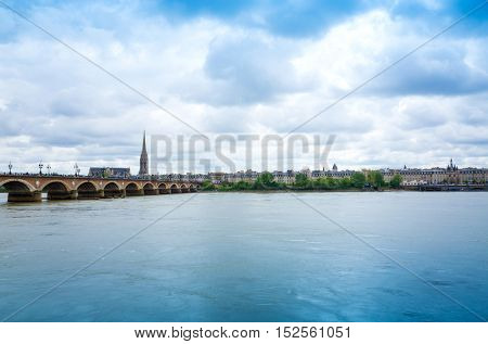 Old stony bridge in Bordeaux, France Europe