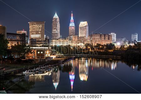 Cleveland city skyline at night across the Cuyahoga river