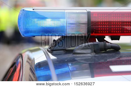 Big Red And Blue Flashing Lights On The Police Car During The Re