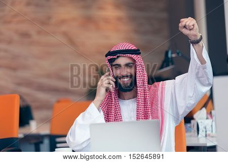 Arabian Businessman Working In Modern Startup Office