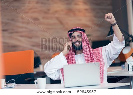 Arabian Businessman Working In Modern Startup Office