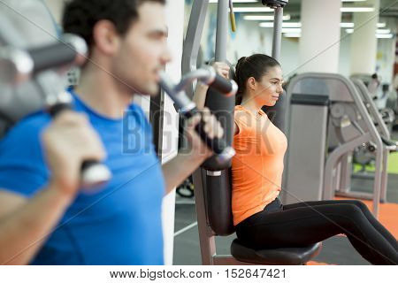 Young Couple In The Gym