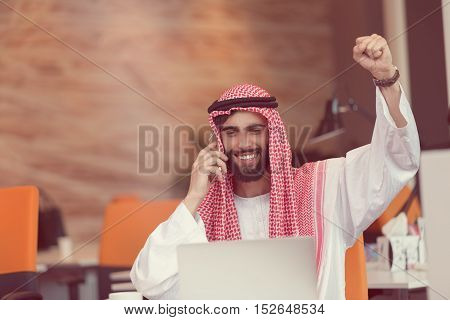 Arabian Businessman Working In Modern Startup Office