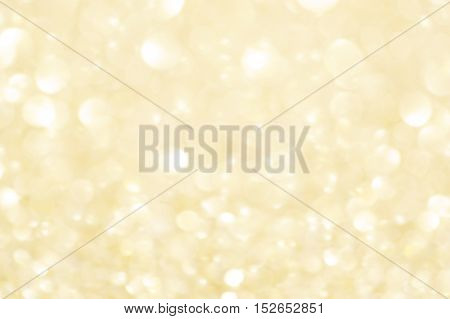 Festive blur background. Abstract twinkled Christmas background with bokeh defocused golden lights and stars.
