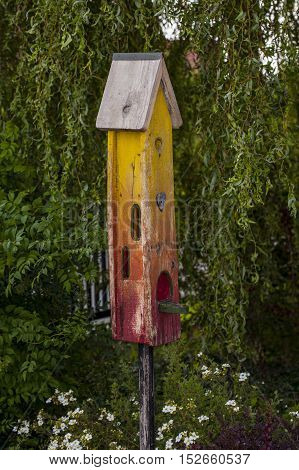 Multi-colored Box For Birds With Feed Hopper