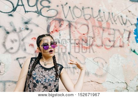 A Young Pretty Girl Spends His Free Time In The City. Photos On