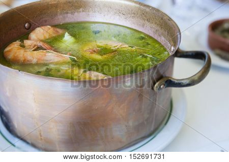 Arroz de Tamboril or soupy seafood rice portuguese recipe