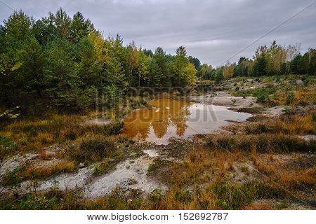 Colorful lake in the former open-cast mine in Leknica