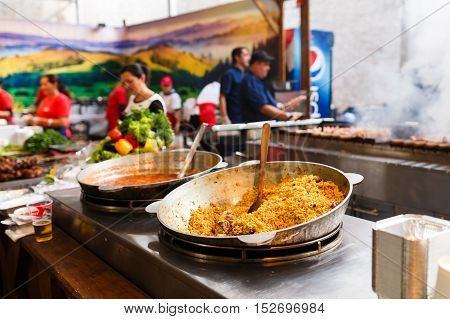 Kiyv Ukraine - October 01 2016: Ready meal at the festival on Darynok Street food market located on an abandoned factory Platforma on the outskirts of Kiyv
