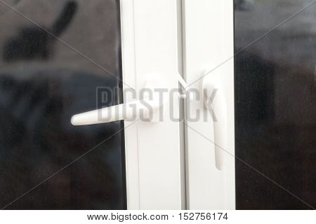 White Window handle on fiberglass window decor