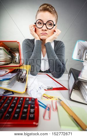 Paperwork job corporation lazy slow boring concept. Bored office employee at work. Female nerdy bureau clerk at desk.