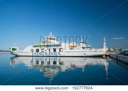 Zadar, Croatia - July 20, 2016: Jadrolinija ferry boat in Gazenica port in Zadar, Croatia. Car ferry boats linking the islands to mainland