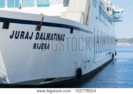Zadar, Croatia - July 20, 2016: Jadrolinija ferry boat in Gazenica port in Zadar, Croatia. Car ferry boats linking the islands to mainland