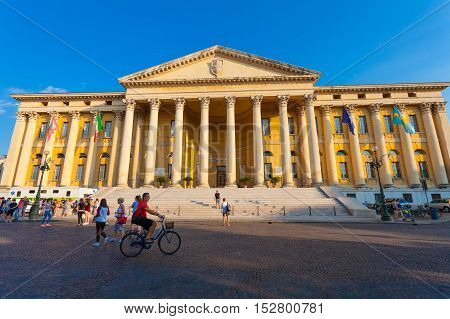 VERONA ITALY- September 08 2016: Tourists in the square front of Palazzo Barbieri town hall Verona Italy.