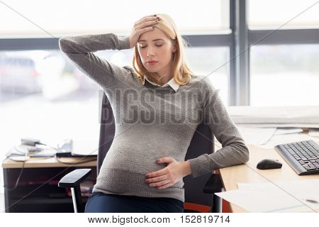 pregnancy, business, stress, gestosis and work concept - pregnant businesswoman feeling sick at office work