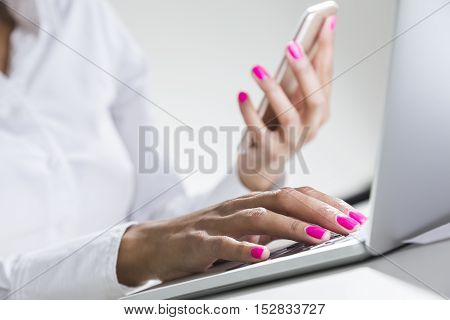 Close Up Of Beautiful African Girl's Hands With Smartphone