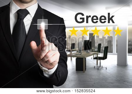 businessman translator in office writing greek in the air