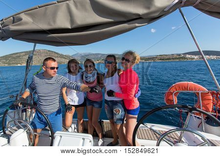 HYDRA, GREECE - SEP 28, 2016: Sailors participate in sailing regatta 16th Ellada Autumn 2016 among Greek island group in the Aegean Sea, in Cyclades and Saronic Gulf.