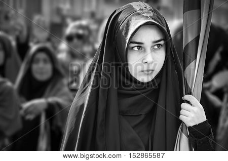 Istanbul Turkey - October 11 2016: Muslims worldwide marks Ashura Istanbul Shiite community. Turkish Shia Muslims mourning for Imam Hussain. Caferis take part in a mourning procession marking the day of Ashura in Istanbul's Kucukcekmece district Turkey on