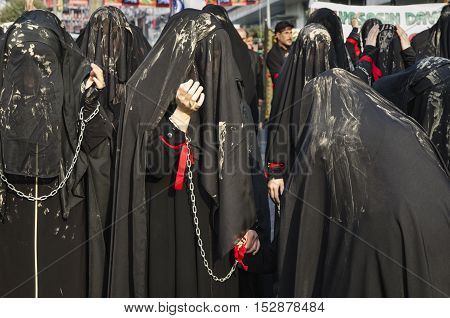 Istanbul Turkey - October 11 2016: Muslims worldwide marks Ashura Istanbul Shiite community. Turkish Shia Muslims mourning for Imam Hussain. Caferis take part in a mourning procession marking the day of Ashura in Istanbul's Kucukcekmece district Turkey on