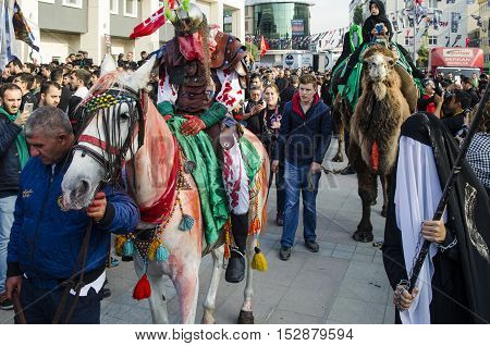 Istanbul Turkey - October 11 2016: Muslims worldwide marks Ashura Istanbul Shiite community. Turkish Shia Muslims mourning for Imam Hussain. Caferis take part in a mourning procession marking the day of Ashura in Istanbul's Kucukcekmece district Turkey on