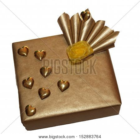 Luxury wrapped gift wiht hearts in gold color