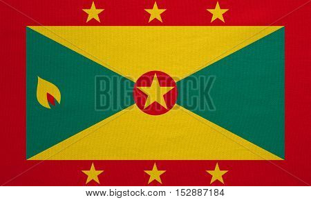 Grenadian national official flag. Patriotic symbol banner element background. Correct colors. Flag of Grenada with real detailed fabric texture accurate size illustration