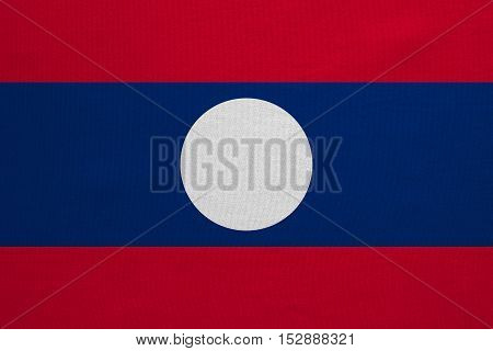 Laotian national official flag. Patriotic symbol banner element background. Correct colors. Flag of Laos with real detailed fabric texture accurate size illustration