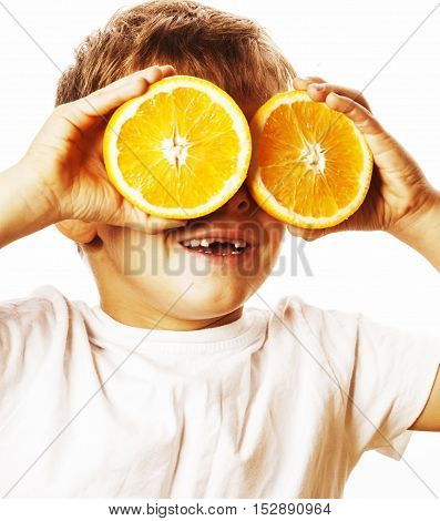 little cute boy with orange fruit double isolated on white smiling without front teeth adorable kid cheerful close up