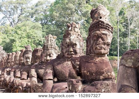 Demon or Asuras ( in Sanskrit) row at entrance of Angkor Thom,Siem Reap, Cambodia.