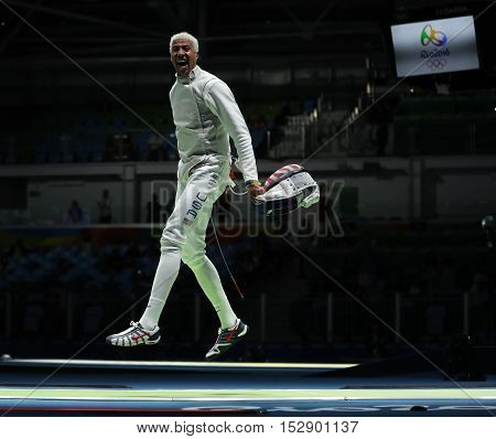 RIO DE JANEIRO, BRAZIL - AUGUST 12, 2016: Fencer Miles Chamley-Watson of United States competes in the Men's team foil of the Rio 2016 Olympic Games at the Carioca Arena 3