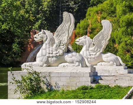 Two Griffins. Griffins is mythological winged beings with a body of a lion and the head of an eagle