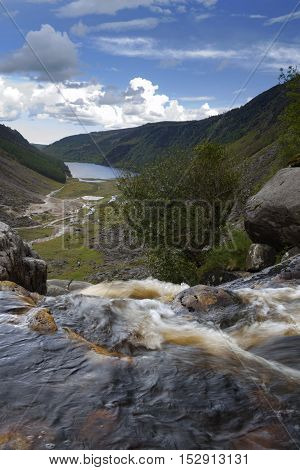 Waterfall overlooking glendalough upper lake, Glandalough, Ireland