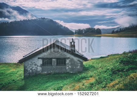 Amazing sunny morning at Champferersee lake in the Swiss Alps. Silvaplana village, Switzerland, Europe. Toned like Instagram filter