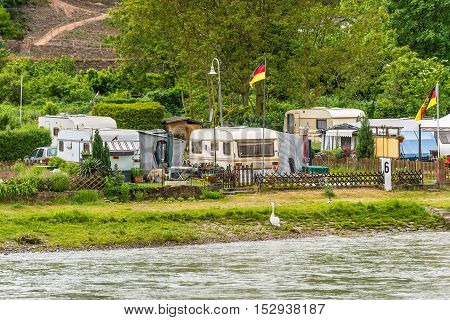 Trechtingshausen Germany - May 23 2016: Camping Marienort in Trechtingshausen near Reichenstein castle in cloudy weather Rhine Valley Rhineland-Palatinate Germany UNESCO World Heritage Site.