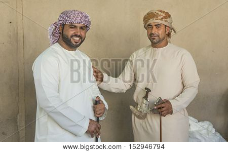 Nizwa Oman October 13th 2016: men at the gun market