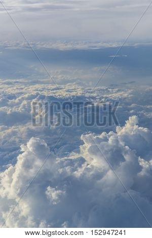 clouds sky sunset. view from the window of an airplane flying in the clouds