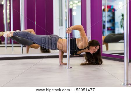 Pretty woman working out at the gym