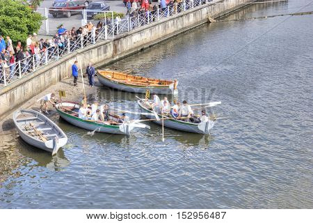 KALININGRAD RUSSIA - September 15.2008: Racing of rowers on oar boats in swimming to down the Pregolya River