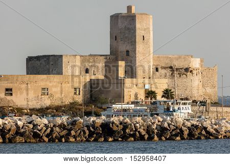 TRAPANI ITALY - AUGUST 10 2016: Castle of Colombaia located on a small island in front of the Trapani's harbor. This is one of the oldest monuments in the city tracing its origins to antiquity.