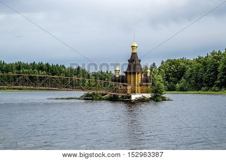 Karelia.Russia.15 Aug 2016 .View of the Church of St. Andrew on the island on the lake Vuoksa in Karelia.