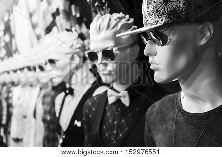 Mannequins in the department of menswear. Sale.