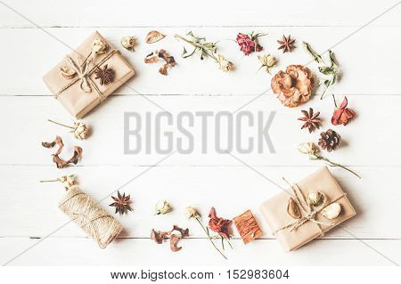 Autumn composition. Frame with gift autumn leaves anise stars dried flowers. Top view flat lay