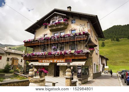 Livigno, Italy - August 1: Tourists Shopping On The Streets Of Duty-free Area On 1 August 2016 In Li